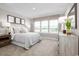Bright bedroom with a large window that offers a scenic view of the outside at 2333 Elowen Ln. # 10B, Longs, SC 29568