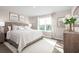 Serene main bedroom with large windows, soft decor, and ample natural light at 2333 Elowen Ln. # 10B, Longs, SC 29568
