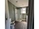 This bathroom showcases a glass enclosed shower and a toilet at 237 Charles Rd., Marion, SC 29571