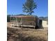 Exterior features covered front porch, ladder, and clear blue sky at 237 Charles Rd., Marion, SC 29571