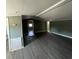 View of spacious room with laminate flooring and green walls at 237 Charles Rd., Marion, SC 29571