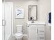 Modern bathroom featuring sleek vanity, framed mirror, glass shower, and neutral color palette at 2521 Rowyn St., Longs, SC 29568