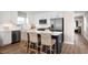 Stylish kitchen featuring white cabinets, stainless steel appliances, and a center island at 2521 Rowyn St., Longs, SC 29568