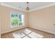 Inviting bedroom with neutral walls and carpet, with light coming through the large window at 2526 Great Scott Dr., Myrtle Beach, SC 29579