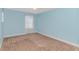 Carpeted bedroom with a window providing natural light and a ceiling fan at 2526 Great Scott Dr., Myrtle Beach, SC 29579