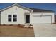 Charming single-Gathering home featuring vinyl siding and a two-car garage at 260 Warner Crossing Way, Loris, SC 29569