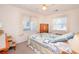 Bright bedroom with a comfortable bed, soft lighting, and neutral carpet at 2602 Perrin Dr., North Myrtle Beach, SC 29582