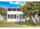 Charming two-story home with a screened porch and lovely landscaping at 2602 Perrin Dr., North Myrtle Beach, SC 29582