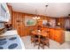Eat in kitchen offering plenty of cabinet space and wood paneling at 2602 Perrin Dr., North Myrtle Beach, SC 29582