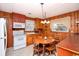 Eat in kitchen offering plenty of cabinet space and wood paneling at 2602 Perrin Dr., North Myrtle Beach, SC 29582
