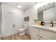 Bathroom with wood floors, white vanity, and toilet at 2701 S Ocean Blvd. # 1908, North Myrtle Beach, SC 29582