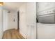 Condo hallway with wood floors, washer and dryer at 2701 S Ocean Blvd. # 1908, North Myrtle Beach, SC 29582