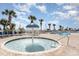 Hot tub featuring a center fountain under sunny skies, with palm trees and lounge chairs in the background at 2701 S Ocean Blvd. # 1908, North Myrtle Beach, SC 29582