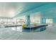 Indoor lazy river with a tiled bottom, support pillars, and access to an outdoor lounging area at 2701 S Ocean Blvd. # 1908, North Myrtle Beach, SC 29582