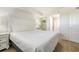 Bright main bedroom with hardwood floors and an ensuite bathroom at 2701 S Ocean Blvd. # 1908, North Myrtle Beach, SC 29582