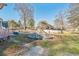 This backyard features a unique rock structure and a covered above-ground swimming pool for outdoor enjoyment at 2945 Old Railroad Rd., Conway, SC 29527