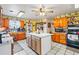 Cozy kitchen with an island, ample cabinet space, and tile flooring at 2945 Old Railroad Rd., Conway, SC 29527