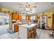 Functional kitchen featuring a center island, bright countertops, and ample wood cabinet storage at 2945 Old Railroad Rd., Conway, SC 29527