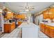 Spacious kitchen featuring wood cabinets, a large island, and ample storage, perfect for culinary enthusiasts at 2945 Old Railroad Rd., Conway, SC 29527