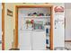Functional laundry room with modern washer and dryer, and storage shelves for efficient organization at 2945 Old Railroad Rd., Conway, SC 29527