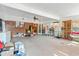 Bright sunroom with brick accent wall, a ceiling fan, and multiple entryways at 2945 Old Railroad Rd., Conway, SC 29527