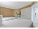 The bedroom features twin beds, a dresser, a TV, and closet with ample storage space at 300 N Ocean Blvd. # 1026, North Myrtle Beach, SC 29582