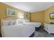 Bright and cheerful bedroom with two comfortable beds and coordinated decor at 300 N Ocean Blvd. # 1026, North Myrtle Beach, SC 29582