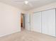 Bedroom featuring neutral walls, doorway leading to a full bath and closets at 310 Junco Circle, Longs, SC 29568