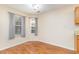 Cozy dining area with natural light, wood flooring and a serene atmosphere at 310 Junco Circle, Longs, SC 29568