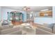 Bright living room with hardwood flooring, neutral paint colors, and ample natural light at 310 Junco Circle, Longs, SC 29568