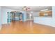 Spacious living area with hardwood floors, ceiling fan, and plenty of natural light at 310 Junco Circle, Longs, SC 29568