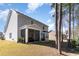A well-maintained backyard with a screened porch and patio offers a relaxing outdoor living space at 378 Dunbarton Ln., Conway, SC 29526