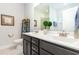 The bathroom features a double sink vanity, a large mirror, and ample storage space at 378 Dunbarton Ln., Conway, SC 29526