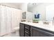 Bright bathroom featuring a double sink vanity with modern fixtures and a shower/tub combo at 378 Dunbarton Ln., Conway, SC 29526