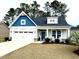 Charming single-Gathering home featuring a well-maintained lawn and attached two-car garage at 378 Dunbarton Ln., Conway, SC 29526