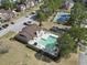Aerial view of the community pool, tennis court, and nearby parking at 380 Myrtle Greens Dr. # E, Conway, SC 29526