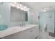 Bright bathroom featuring a marble vanity and a stylish mirror with great lighting at 3901-B Birchwood St., North Myrtle Beach, SC 29582