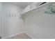 Walk-in closet with upper shelving and a hanging rod for storage convenience at 3901-B Birchwood St., North Myrtle Beach, SC 29582