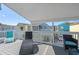 Spacious deck with comfortable seating and views of the colorful neighborhood homes at 3901-B Birchwood St., North Myrtle Beach, SC 29582