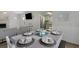 Coastal-themed dining area with table set for six and modern decor at 3901-B Birchwood St., North Myrtle Beach, SC 29582