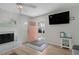 Bright entryway featuring a fireplace and coat hooks for convenience at 3901-B Birchwood St., North Myrtle Beach, SC 29582
