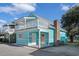 Charming blue beach house with a cozy upstairs balcony and brick chimney at 3901-B Birchwood St., North Myrtle Beach, SC 29582