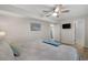 A spacious and calming bedroom design featuring a ceiling fan and a bed at 3901-B Birchwood St., North Myrtle Beach, SC 29582