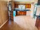 Kitchen featuring blue countertops and dark wood cabinets at 422 S Magnolia Ave., Andrews, SC 29510