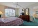 Comfortable bedroom with a ceiling fan and nice natural light at 4257 Villas Dr. # 106, Little River, SC 29566