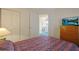 Bedroom with a TV on the dresser and an ensuite bathroom at 4257 Villas Dr. # 106, Little River, SC 29566