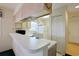 Functional kitchen with ample counter space, cabinets, and a breakfast bar at 4257 Villas Dr. # 106, Little River, SC 29566