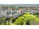 Aerial view of condo community overlooking a golf course with beautiful landscaping and water features at 4701 Wild Iris Dr. # 16-204, Myrtle Beach, SC 29577