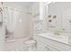 Clean bathroom with white cabinets, shower-tub combo, and a neutral color scheme at 4701 Wild Iris Dr. # 16-204, Myrtle Beach, SC 29577