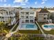 Impressive elevated home with pool, landscaped yard, and multiple decks for outdoor enjoyment at 4843 Williams Island Dr., Little River, SC 29566